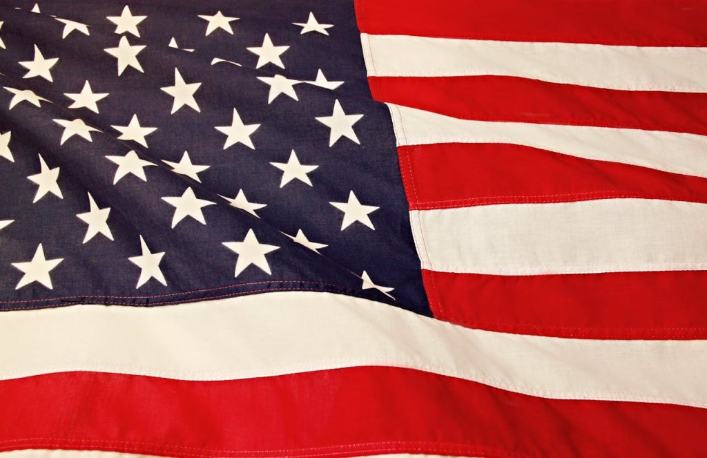 Detailed image of the American flag showcasing the stars and stripes symbolizing USAs patriotism and pride.